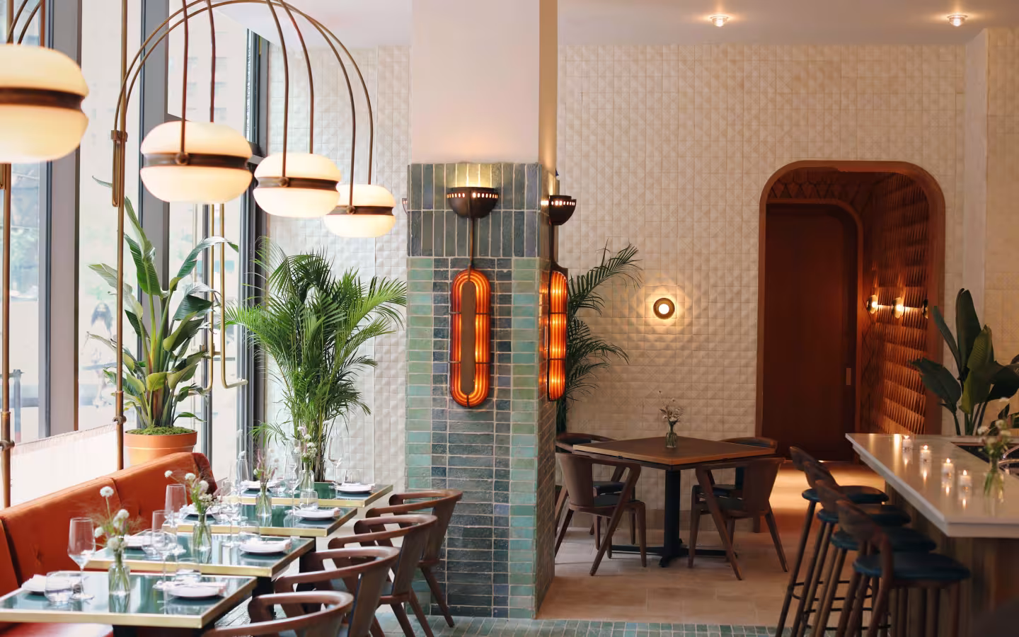 The interior of Zou Zou’s at Manhattan West, a BGRE retail destination in Midtown Manhattan, New York City, featuring contemporary restaurant design, warm lighting and curated furnishings. 