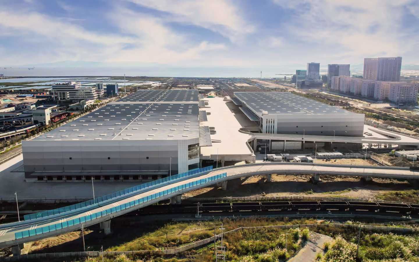 Aerial view of Wenzhou Yueqing Park, a BGRE logistics property in China, featuring large format distribution facilities with direct access to transportation networks.