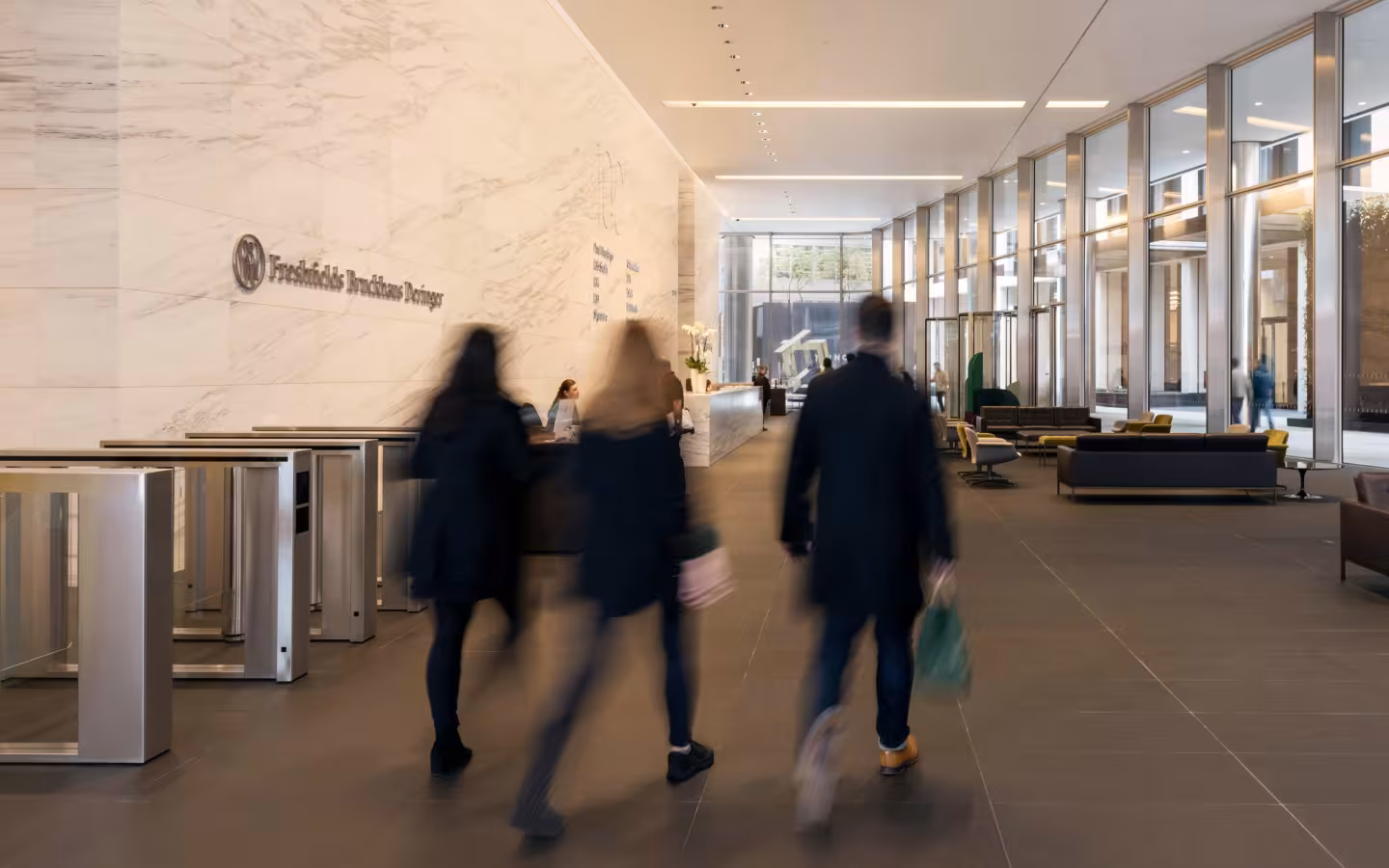 Interior view of 100 Bishopsgate, a BGRE office building in the City of London, featuring a contemporary lobby, premium workplace amenities and modern office space with floor-to-ceiling glass and natural light.