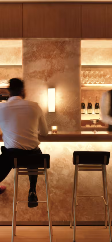 Interior view of two guests at Bar Pendry, part of Pendry Manhattan West within BGRE's Manhattan West development in Midtown Manhattan.