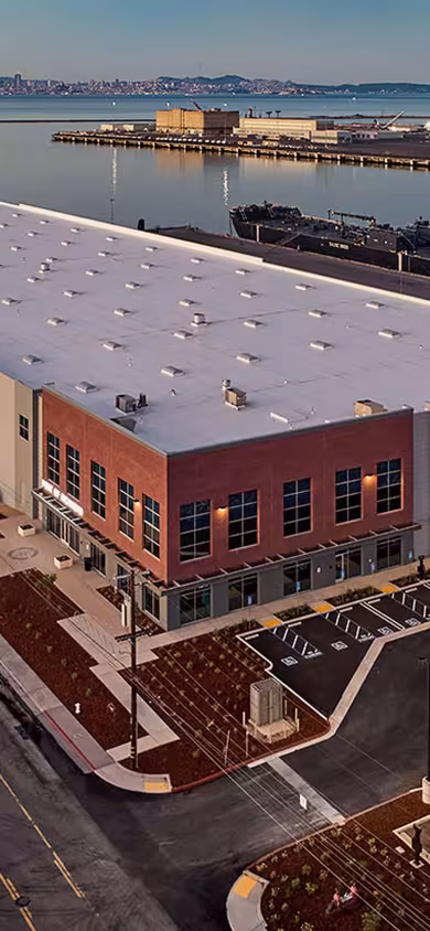 Aerial view of Portside Commerce Center, a BGRE logistics property in the San Francisco Bay Area, featuring modern warehouse facilities and waterfront access.