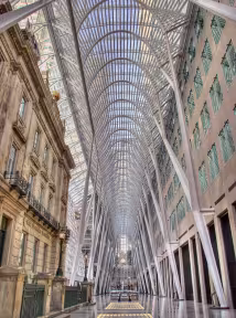 Light-filled atrium in a BGRE office building, featuring contemporary architecture and indoor public gathering spaces.