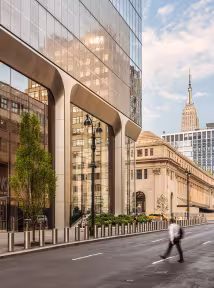Two Manhattan West, a BGRE office building in Midtown Manhattan, New York City, featuring modern glass façades, a pedestrian-friendly streetscape and premier office space.
